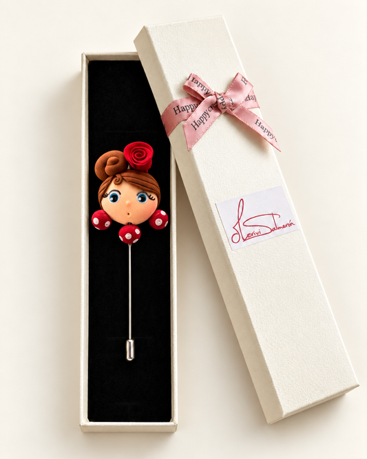 Alfiler de flamenca castaño y rojo presentado en su caja de regalo Mariví Salmerón